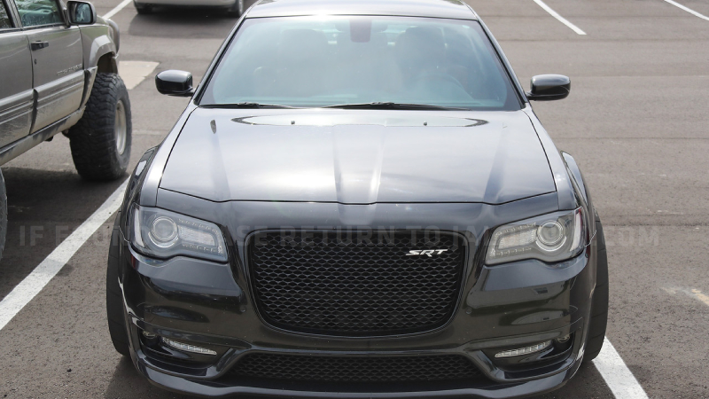 Illustration for article titled What The Hell Is This Widebody Chrysler 300 SRT With Dodge Demon Wheels?